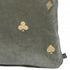 Pillow in dark green color with Gold embroidery close up