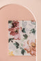 A Print Art in White and multiple colors, on a pink wall Styled